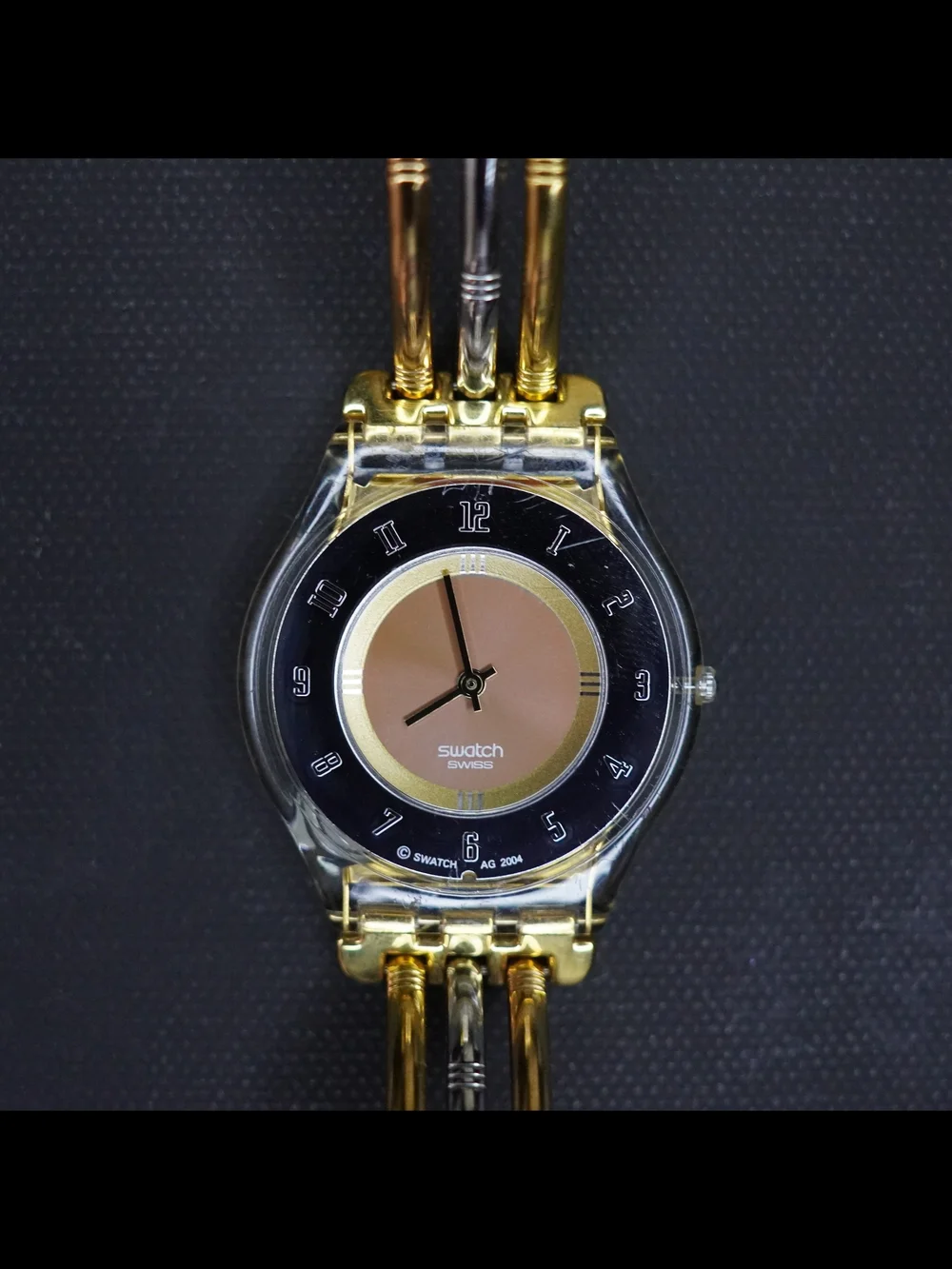 Vintage Swatch Swiss Quartz Transparent Gold Tone Black Dial Ladies Watch Runs